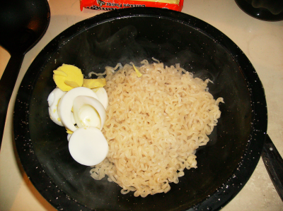 Ramen and a sliced boiled egg